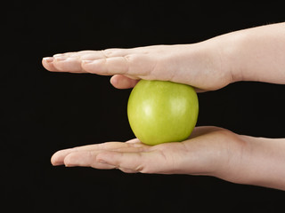 Childs hands with apple