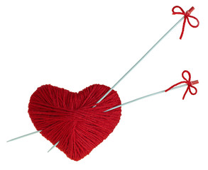 red handmade woolen heart with spokes arrows, isolated on white