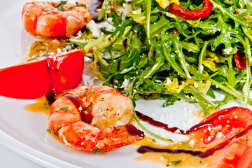 shrimps cocktail appetizer on brown towel with lemon and cherry