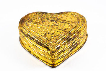 Golden heart on a white background