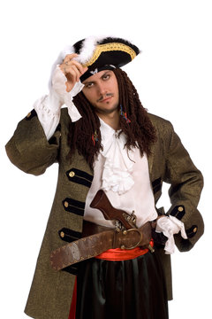 Portrait of young man in a pirate costume