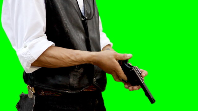 Man with gun on green background
