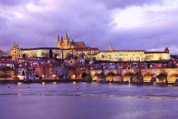 View on Prague gothic Castle with Charles Bridge after Sunset