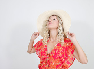 young attractive woman in straw hat