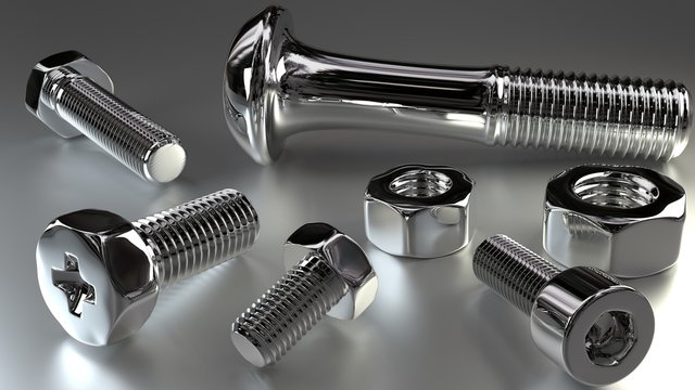 shiny chrome bolts and nuts still life