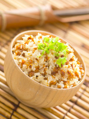 close up of a bowl of garlic fried rice