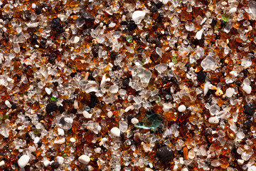 Closeup of glass fragments on beach