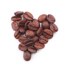 Heart shaped coffee beans isolated on white background