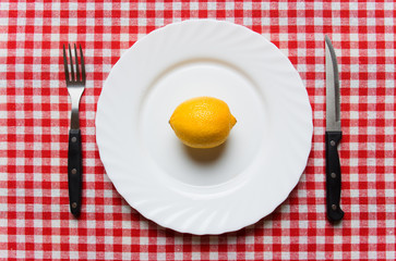 Fresh lemon served on plate