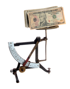 very old letter scales with dollar notes