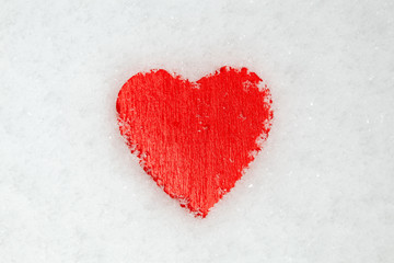 red heart on the snow