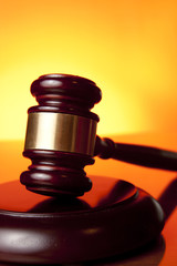 judge gavel on orange background