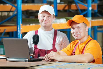 manual workers in warehouse