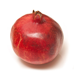 Pomegranate isolated on a white studio background.