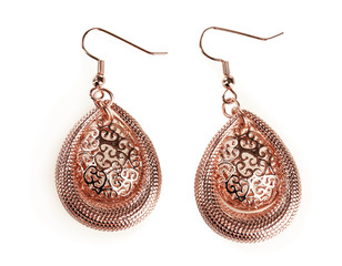 beautiful gold earrings isolated on white