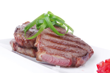 roasted beef meat strips on white