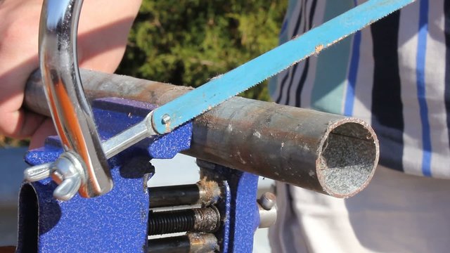 Hacksaw Trying To Cut Hard Pipe Fail