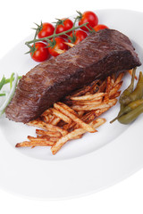 meat on potato chips with fresh tomato