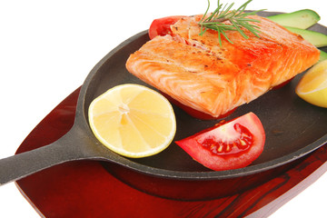 roast salmon piece with tomatoes