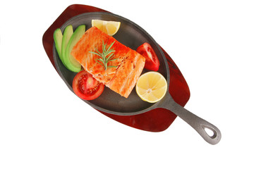 roast salmon piece with tomatoes
