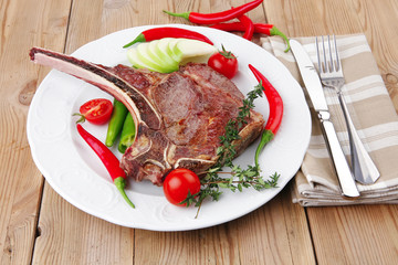 savory : roasted beef spare rib on white dish tomato