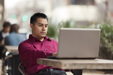 Hispanic Businessman - Cafe Laptop Working