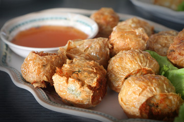 Deep-fried crab meat and minced pork in crab shell