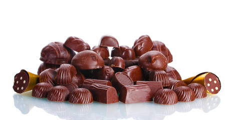 Many different chocolate candy isolated on white