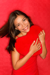Love woman showing red heart