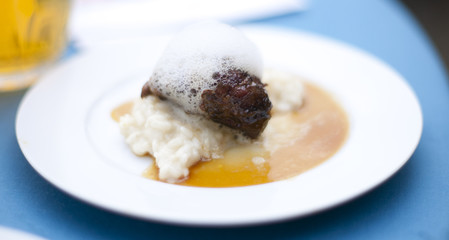 Glazed cheek of Iberian pork in sherry and cream with rice and m