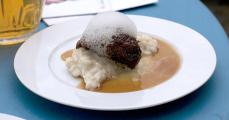 Glazed cheek of Iberian pork in sherry and cream with rice and m