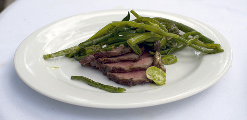 Grilled Marchigiana beef with bean salad