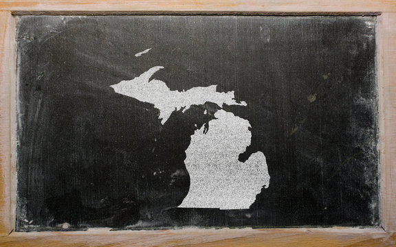 outline map of us state of michigan on blackboard