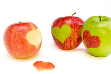 three apples with hearts