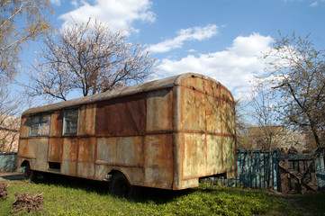 Old rusty bus in the garden