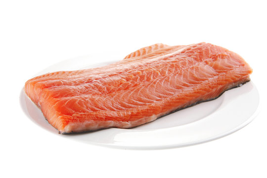 Raw Salmon Fillet On White Plate