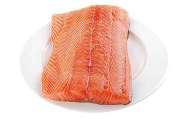 salmon fillet on white plate