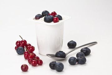 yogurt in plastic box container over white background