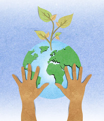 Green leaf with hand recycled paper craft .