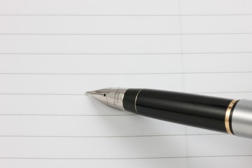 Fountain Pen and Notepad