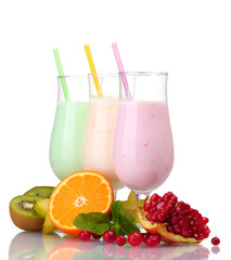 Milk shakes with fruits isolated on white