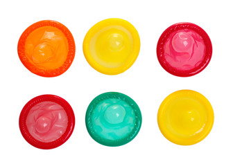 Colorful condoms isolated on white