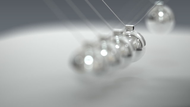 Balancing balls, Newton's cradle. Repeatedly