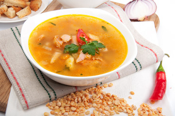 Peas soup with crouton on a linen