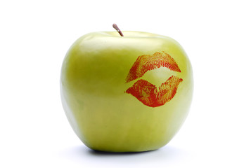 Green apple with lipstick print