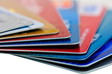 Credit cards and pen as a background.