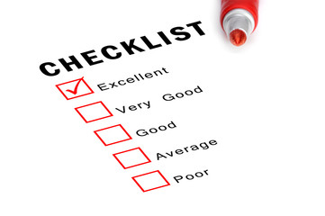 Checklist with red marker and checked boxes.