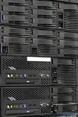 servers stack with hard drives in a datacenter