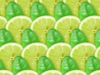 Photo sur Aluminium Tranches de fruits Fond de tranches de citron vert et feuille verte