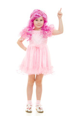 A girl with pink hair in a pink dress points to the top